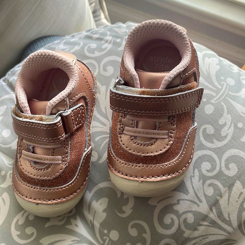 Brand new baby girl tennis shoes.